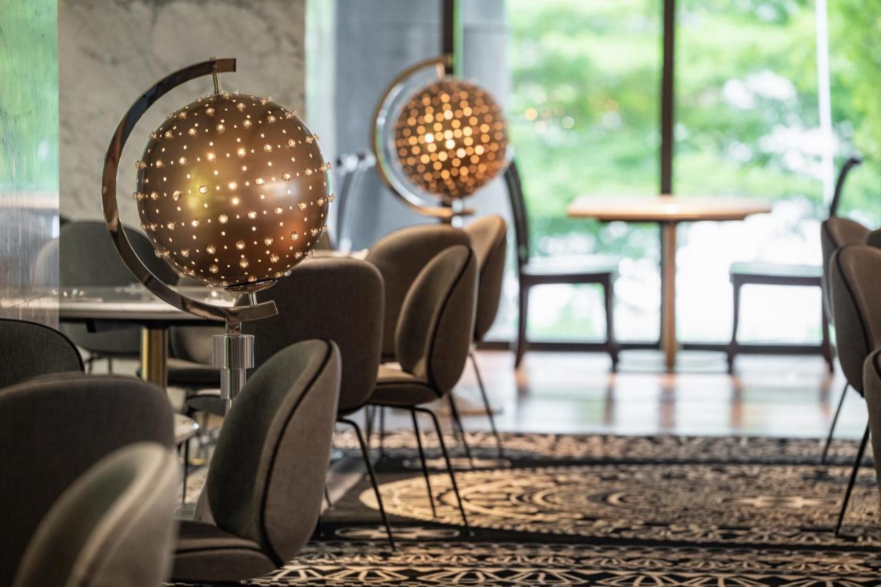 Le Meridien ไถจง ภายนอก รูปภาพ The interior of the lounge