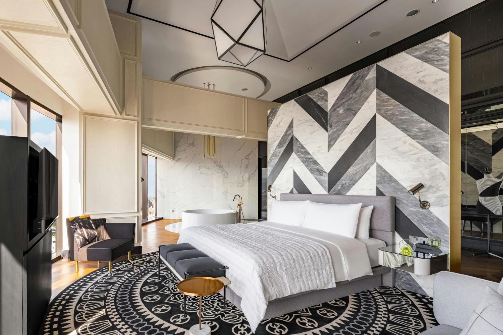 Le Meridien ไถจง ภายนอก รูปภาพ A bedroom at the hotel